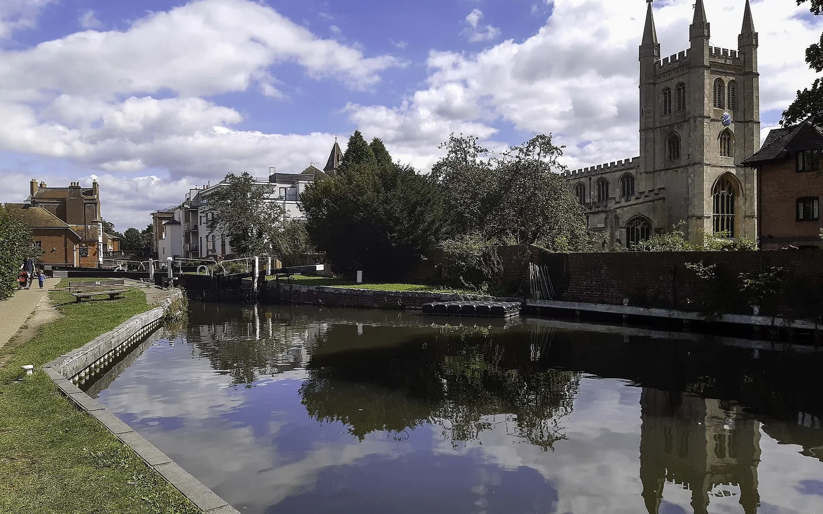 The Kennet and Avon Canal in Newbury, with a church tower behind